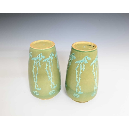 608 - Ruskin Pottery, a pair of slip stencilled Souffle Glaze vases, circa 1901, shouldered form, decorate... 