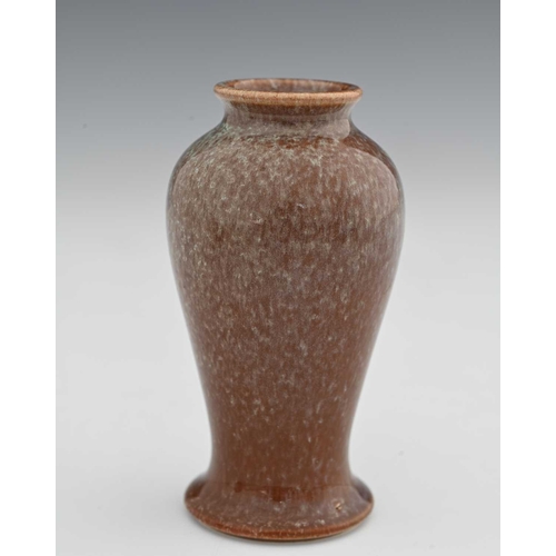 609 - Ruskin Pottery, a small Souffle Glaze vase, 1905, inverse baluster form, duck egg blue speckled over... 