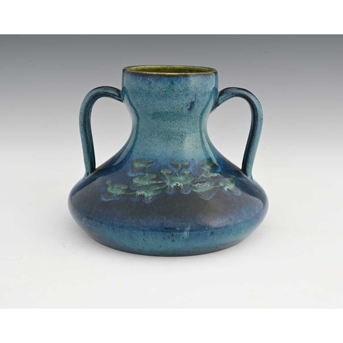 613 - Ruskin Pottery, a Souffle Glaze twin handled water lily vase, circa 1901, squat flared double gourd ... 