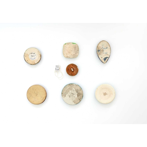 615 - Ruskin Pottery, a collection of Souffle glazed roundel plaques and buttons, various colours, some st... 