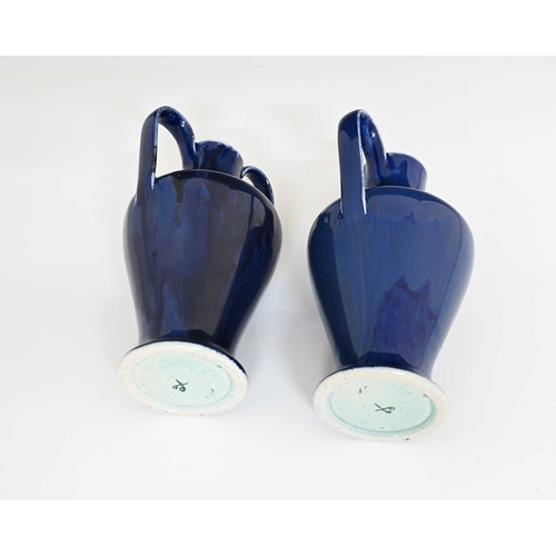 616 - Ruskin Pottery, a pair of Souffle Glaze twin handled vases, circa 1901, shouldered inverse baluster ... 