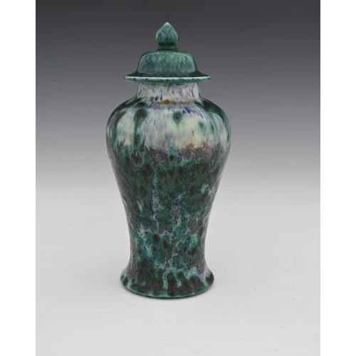 634 - Ruskin Pottery, a High Fired vase and cover, 1905, of temple jar form, inverse baluster with domed l... 