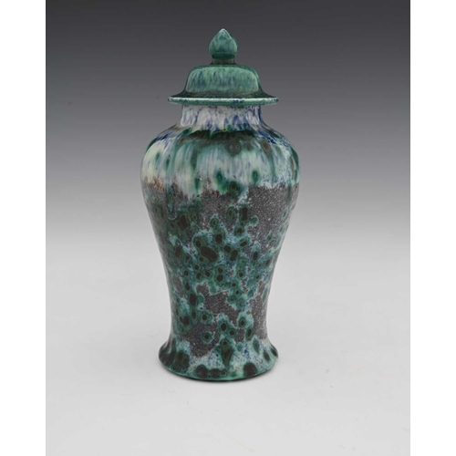 634 - Ruskin Pottery, a High Fired vase and cover, 1905, of temple jar form, inverse baluster with domed l... 