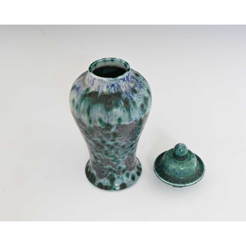 634 - Ruskin Pottery, a High Fired vase and cover, 1905, of temple jar form, inverse baluster with domed l... 