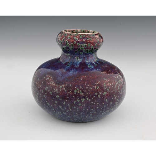 641 - Ruskin Pottery, a High Fired vase, 1926, squat double gourd form, green speckled purple and sang de ... 