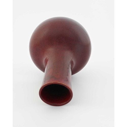 645 - Ruskin Pottery, a High Fired vase, 1905, spherical bulbous form with elongated neck, sang de boeuf s... 