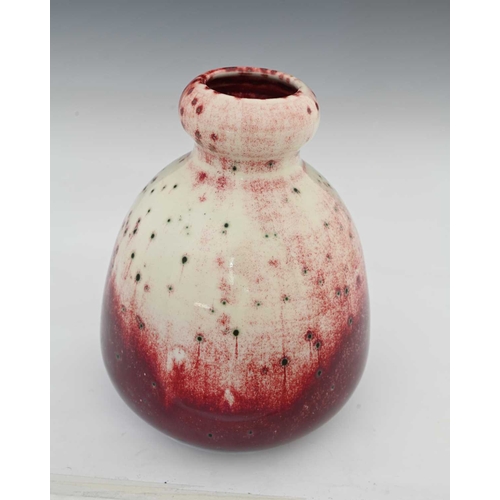 648 - Ruskin Pottery, a High Fired vase, 1933, conical double gourd form, green speckled white over red sa... 