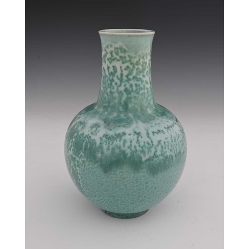 649 - Ruskin Pottery, a High Fired vase, 1906, spherical form with long flared neck, turquoise flambe spec... 