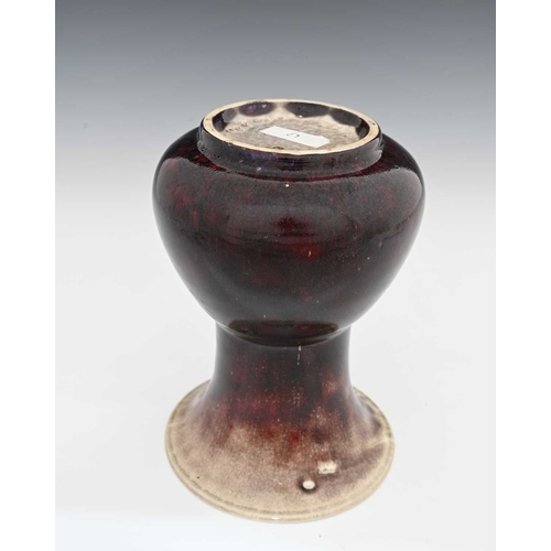 651 - Ruskin Pottery, a High Fired vase, 1912, conical bulbous form with flared trumpet neck, dark sand de... 