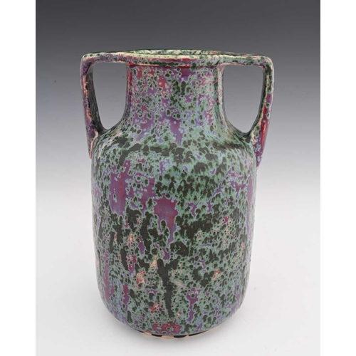 657 - Ruskin Pottery, a High Fired twin handled vase, circa 1930, cylindrical shouldered form with angled ... 