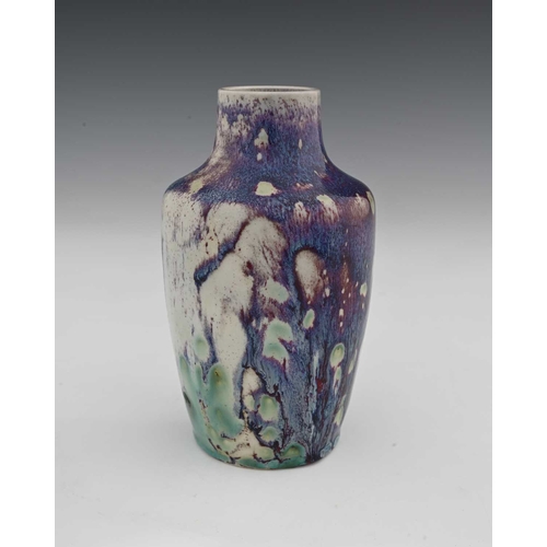 658 - Ruskin Pottery, a High Fired vase, 1920, shouldered form, marbled purple hared fur over white sang d... 