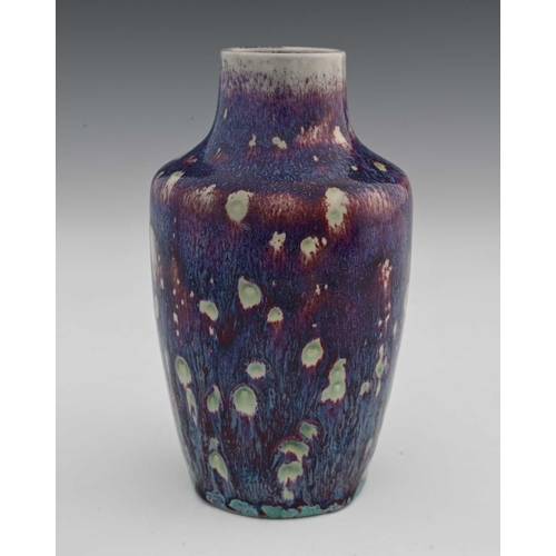 658 - Ruskin Pottery, a High Fired vase, 1920, shouldered form, marbled purple hared fur over white sang d... 