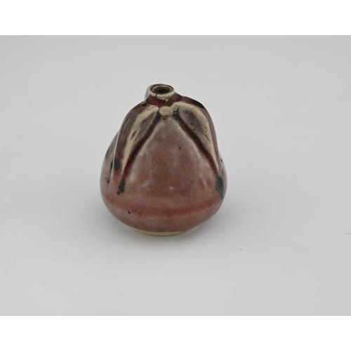 663 - Ruskin Pottery, a miniature High Fired vase, circa 1920s, conical form with three buttress ribs to t... 