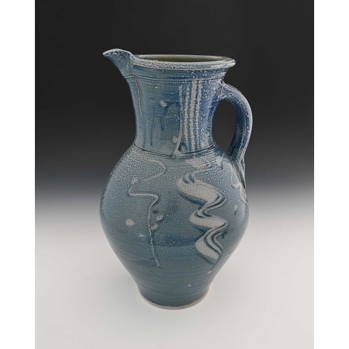 669 - Michael Casson, a large studio pottery salt glazed jug, ovoid form with wide neck, incised vertical ... 