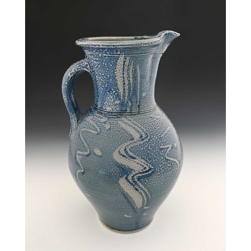 669 - Michael Casson, a large studio pottery salt glazed jug, ovoid form with wide neck, incised vertical ... 