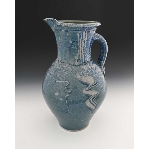 669 - Michael Casson, a large studio pottery salt glazed jug, ovoid form with wide neck, incised vertical ... 