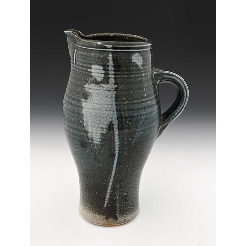 670 - Michael Casson, a studio pottery jug, elongated barrel form, gray blue glazed with abstract painted ... 