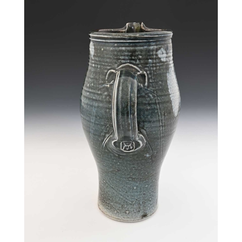 670 - Michael Casson, a studio pottery jug, elongated barrel form, gray blue glazed with abstract painted ... 