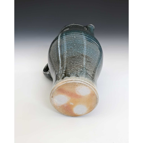 670 - Michael Casson, a studio pottery jug, elongated barrel form, gray blue glazed with abstract painted ... 