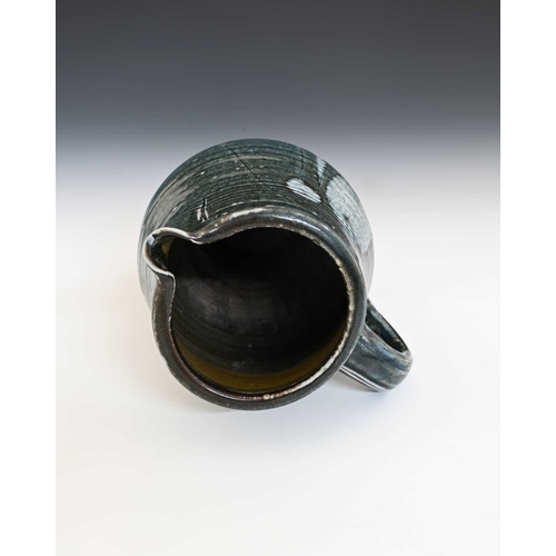 670 - Michael Casson, a studio pottery jug, elongated barrel form, gray blue glazed with abstract painted ... 