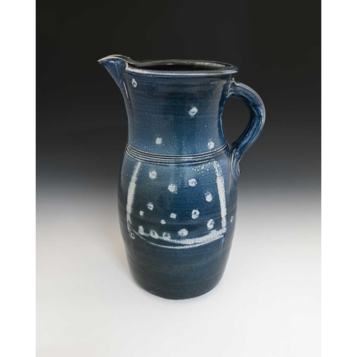 673 - Michael Casson, a large studio pottery salt glazed stoneware jug, barrel form with pulled spout, ran... 