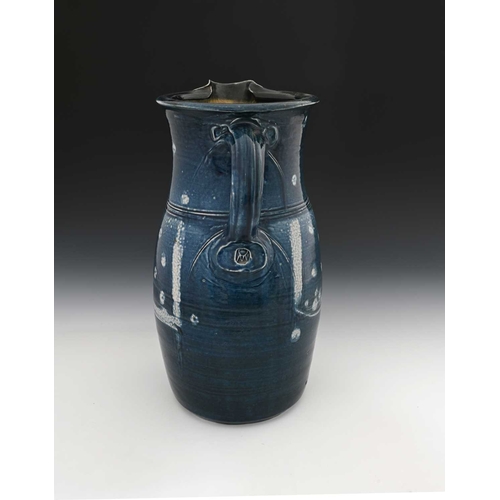 673 - Michael Casson, a large studio pottery salt glazed stoneware jug, barrel form with pulled spout, ran... 