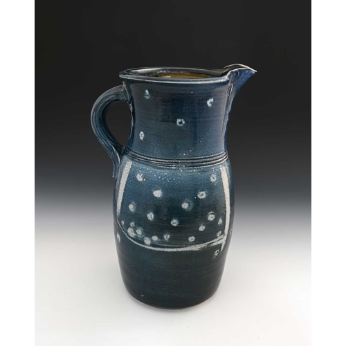 673 - Michael Casson, a large studio pottery salt glazed stoneware jug, barrel form with pulled spout, ran... 