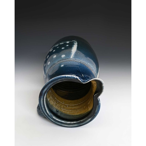 673 - Michael Casson, a large studio pottery salt glazed stoneware jug, barrel form with pulled spout, ran... 