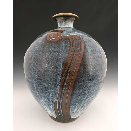 674 - David Frith (British, 1943), a large stoneware bottle vase, decorated with a Chun blue over wax resi... 