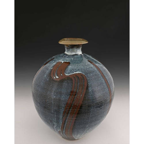 674 - David Frith (British, 1943), a large stoneware bottle vase, decorated with a Chun blue over wax resi... 