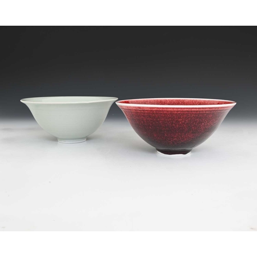 676 - John Masterton (British, 20th/21st Century), a copper red stoneware bowl and a celadon bowl, largest... 