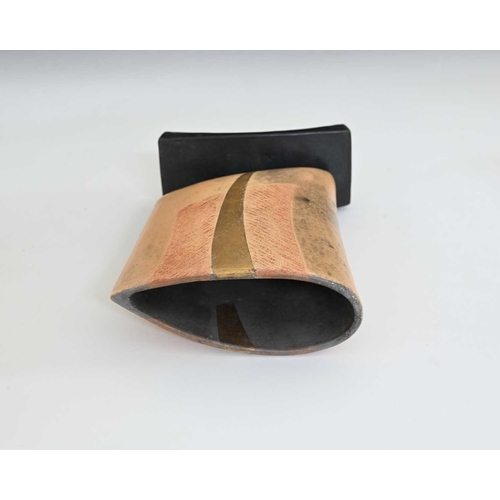 680 - Anne James (British, 1937), a smoked fired vessel, mounted on a black ceramic base, decorated with c... 