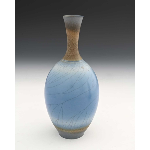 683 - David White (British, 1934-2011), a porcelain narrow-necked bottle vase, decorated with a blue crack... 