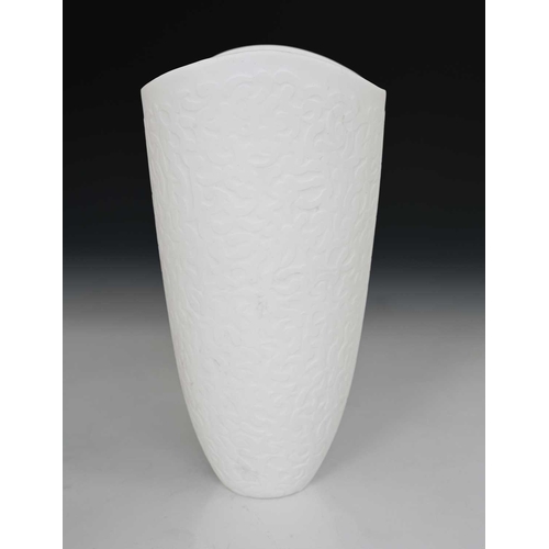 688 - Sasha Wardell (British, 1956), a large slip cast bone china vase, smooth white inside with a repeati... 