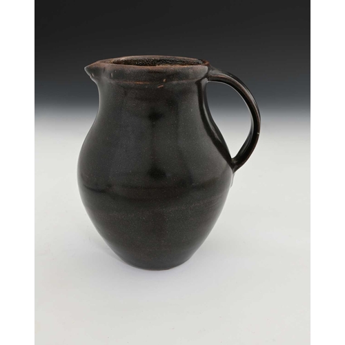 694 - Edmund de Waal (British, 1964), an early stoneware jug, tenmoku glaze exterior with a fine flecked l... 