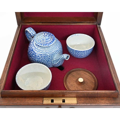 703 - Steve Harrison, a studio pottery salt glazed stoneware tea set, 2002, in fitted mahogany tea chest, ... 