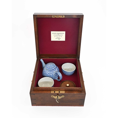 703 - Steve Harrison, a studio pottery salt glazed stoneware tea set, 2002, in fitted mahogany tea chest, ... 