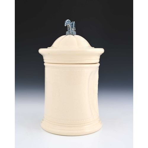 704 - Steve Harrison, a studio pottery jar and cover, 2000, white glazed cylindrical form with dimpled sid... 