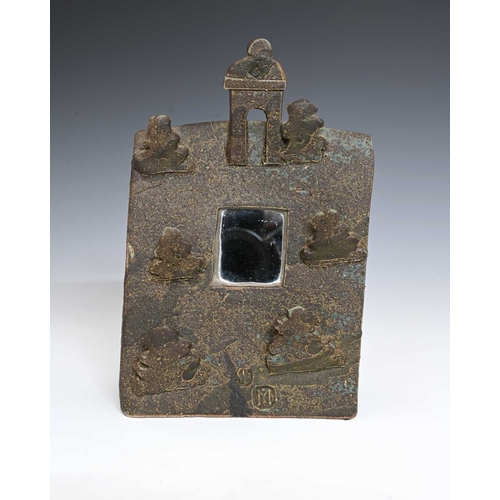 707 - John Maltby (British, 1936-2020), an easel stoneware mirror, decorated with low relief trees and a f... 