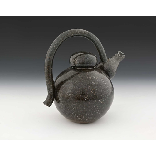 712 - Walter Keeler, a studio pottery salt glazed stoneware teapot, the spherical body with baluster cone ... 