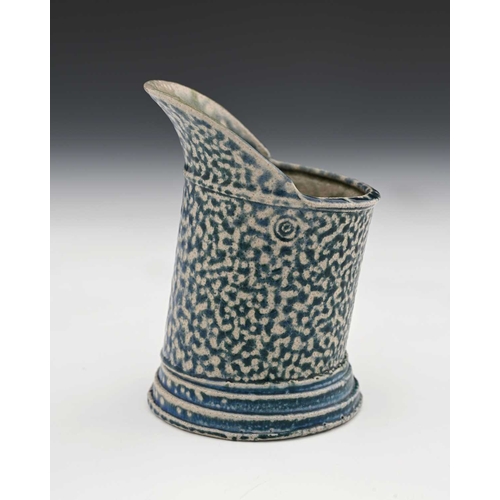 714 - Walter Keeler, a studio pottery salt glazed stoneware jug, lop sided cylindrical form with wide lip,... 