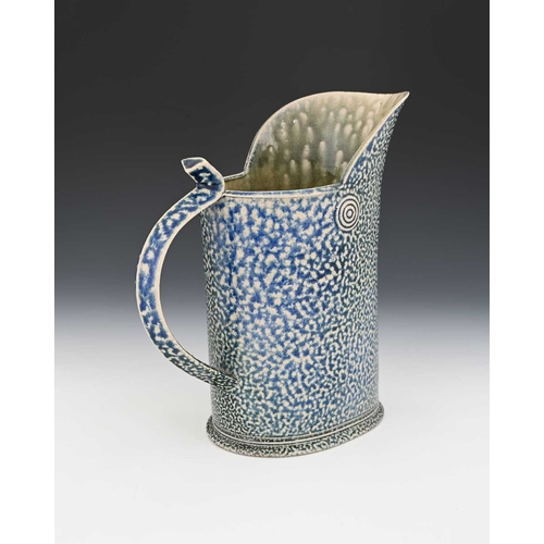 715 - Walter Keeler, a studio pottery salt glazed stoneware jug, oval section helmet form with S form stra... 