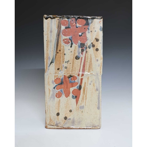 717 - John Maltby (British, 1936-2020), a tall slab-sided vase with a deep tenmoku glaze inside and poured... 