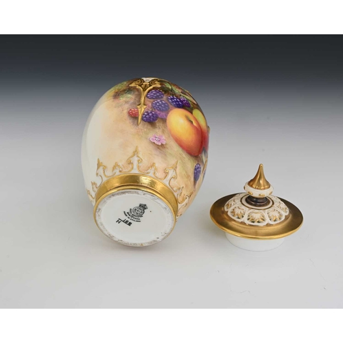 721 - H Ayrton for Royal Worcester, a fruit painted potpourri vase and cover, lobed ovoid form with relief... 