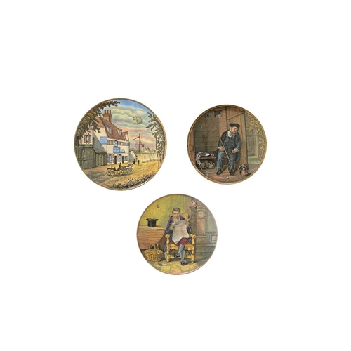 723 - Three Prattware printed pot lids including 'On Guard' and 'The Times' (3)