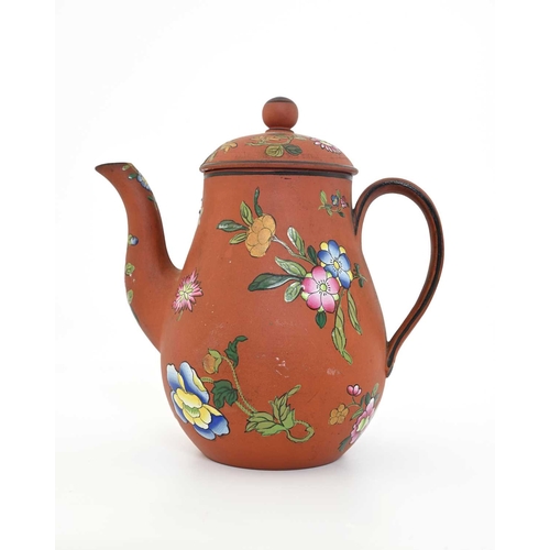 730 - A Wedgwood Capri ware coffee pot, circa 1810, terracotta ground baluster form, decorated with enamel... 