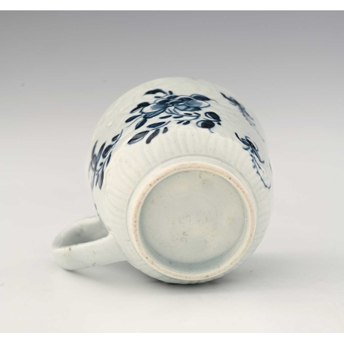 738 - Richard Chaffers, Liverpool, a blue and white porcelain coffee cup, circa 1760, relief moulded chrys... 