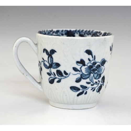 738 - Richard Chaffers, Liverpool, a blue and white porcelain coffee cup, circa 1760, relief moulded chrys... 