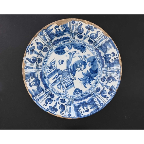 751 - A Liverpool Delft blue and white charger, circa 1740, together with a Dutch Wanli style charger circ... 