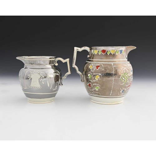 756 - Two English resist lustre jugs, circa 1820, one with enamelled coloured decoration (2)